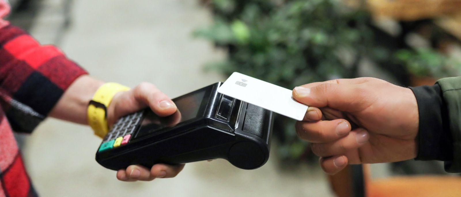 Image of generic card tapping credit card machine